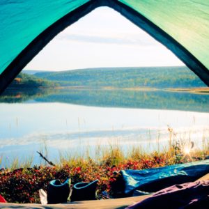 Beautiful calm lake tent view camping