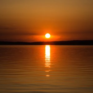 Colorful sunset or sunrise by the lake