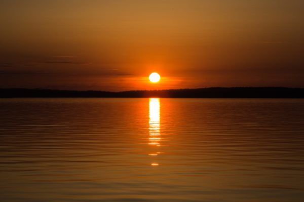 Colorful sunset or sunrise by the lake