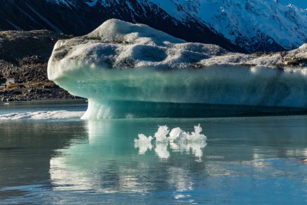 Tasman Glacier Lake with icebergs and mountains, Aoraki Mount Co